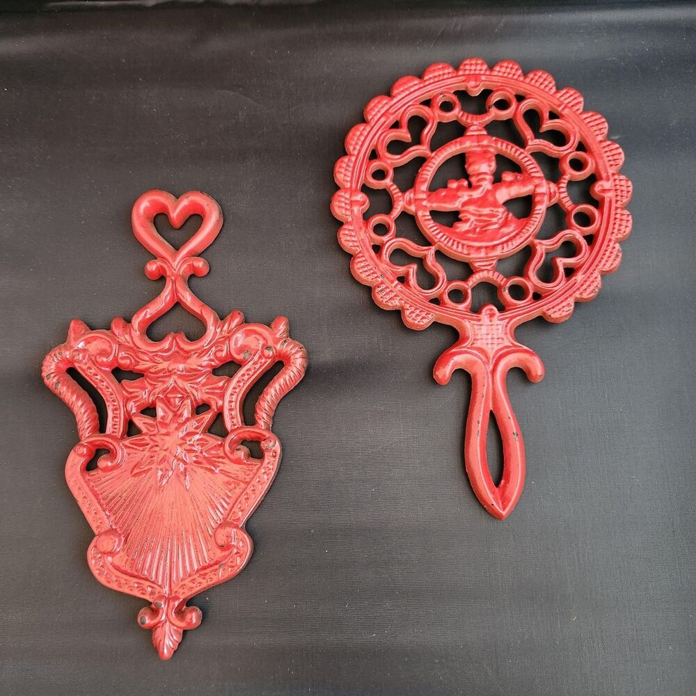 Cast Iron Sunburst Girl Bonnet Footed Trivet Red Enamel Set 2 VTG Folk Art Wall